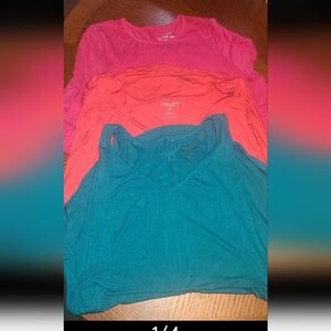 Torrid 3 tops 2 short sleeve and one Tank